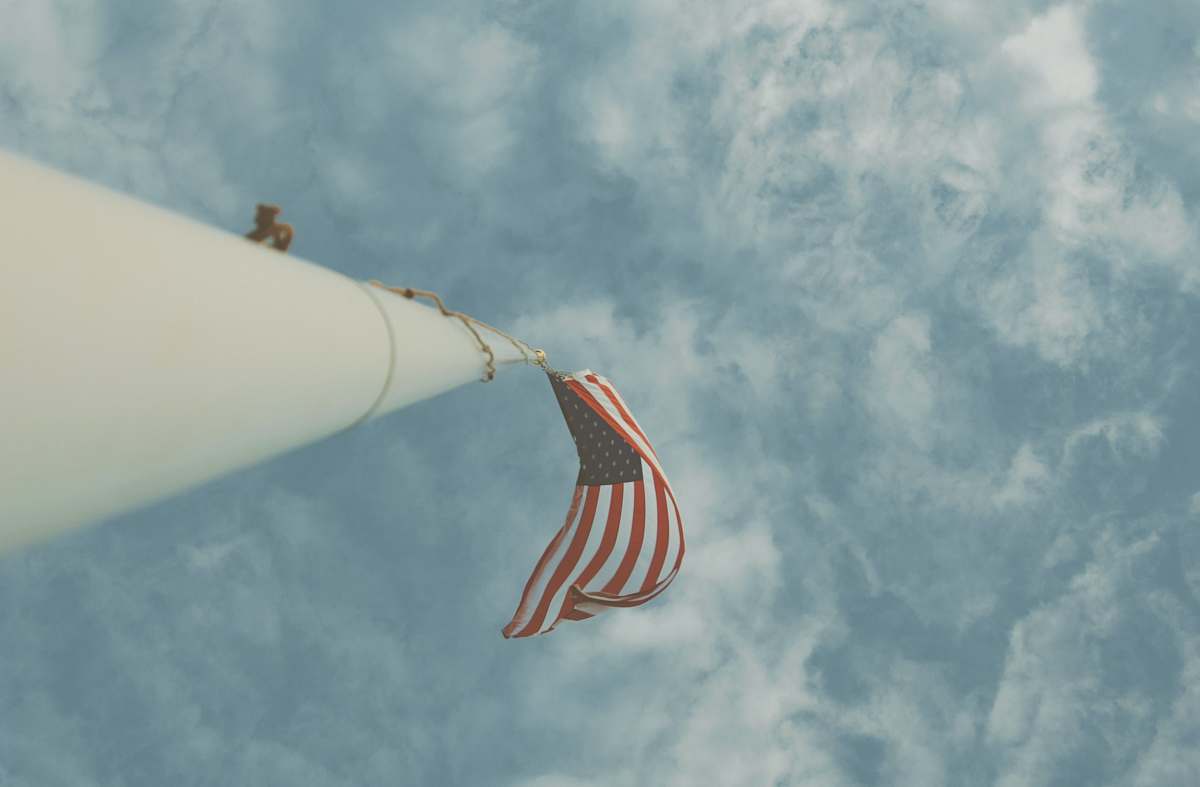 united states low angle photography of US Flag laguna beach